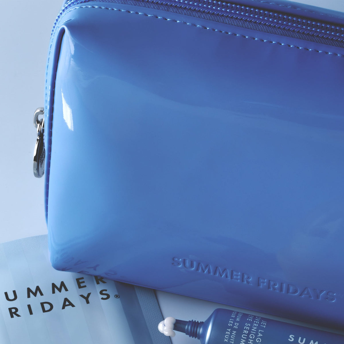 glossy-pouch-in-jet-lag-blue-i9 Glossy-Pouch-Jet-Lag.jpg
